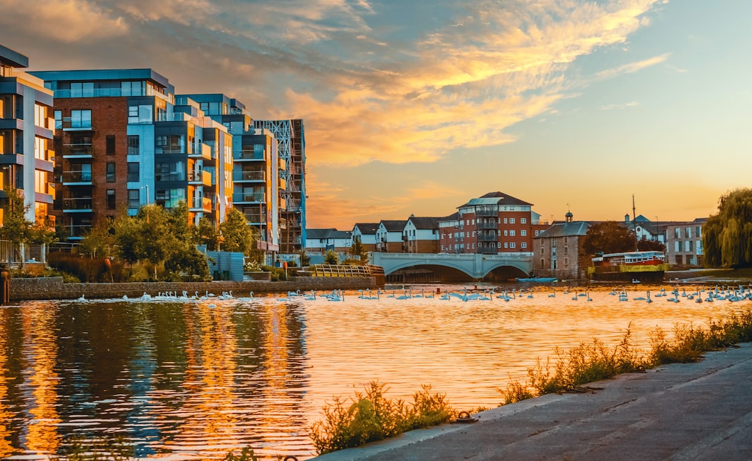 City Centre, Peterborough: body of water near city buildings during daytime